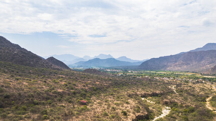 Fototapeta premium Mountain landscape of Mayascón rising above rural valleys in Lambayeque, Peru