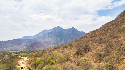 Obraz premium Mountain landscape of Mayascón rising above rural valleys in Lambayeque, Peru