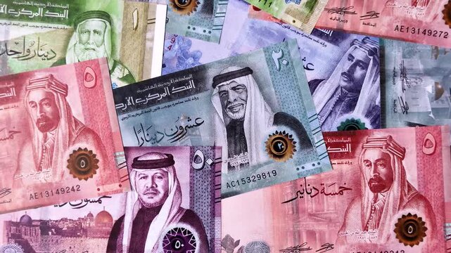 Jordan money, the Jordanian dinar currency, banknotes of various denominations, financial transactions. Jordanian money, the dinar as a financial background for your design