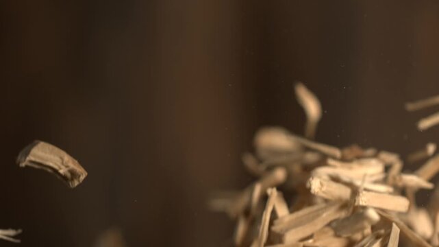 super slow motion Cinematic portrayal of floating brown wood fragments with rustic ambiance and industrial