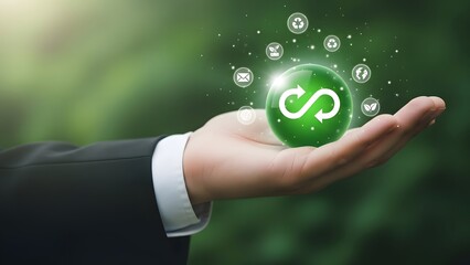A hand holding a glowing green infinity symbol representing eco friendly business practices and sustainability