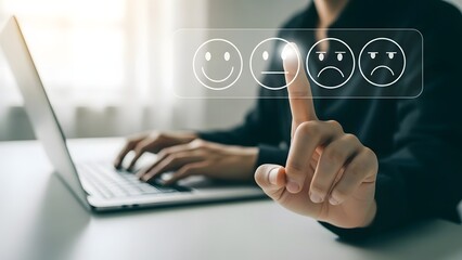 Person interacting with a digital feedback interface on a laptop