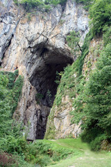 Attractive Potpecka Cave, a natural monument located in the village of Potpece, 14 km southeast of Užice, Serbia. Its gigantic portal, 50 meters high, is the largest cave entrance in the Balkans.