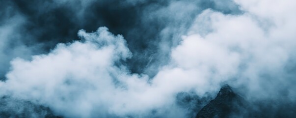 Misty mountain peaks, aerial view, cloudscape background