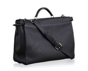 Black leather travel bag with top handle and adjustable shoulder strap, photographed against a white background.