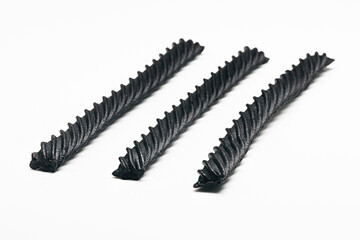 Black Licorice , individual close-up and piles on white background