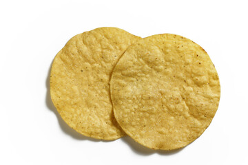 Several whole crunchy Tostados on white background