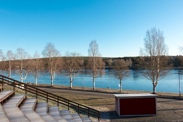 Bank of Kemijoki River in the city of Rovaniemi. Lapland, Finland.