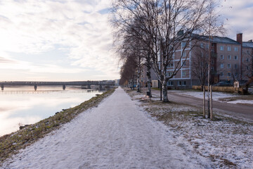 Bank of Kemijoki River in the city of Rovaniemi. Lapland, Finland.