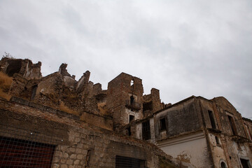 Craco is a famous "Ghost town" in Basilicata, Italy. Residents abandoned it after several earthquakes caused landslides, making the houses on the slopes slide and collapse.
