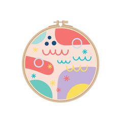 Fototapeta premium Colorful embroidery hoop with abstract designs and playful patterns 