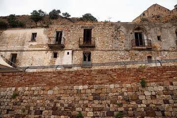 Craco is a famous "Ghost town" in Basilicata, Italy. Residents abandoned it after several earthquakes caused landslides, making the houses on the slopes slide and collapse.