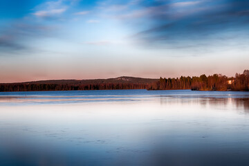 Bank of Kemijoki River in the city of Rovaniemi. Lapland, Finland. HDR.