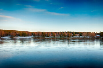 Bank of Kemijoki River in the city of Rovaniemi. Lapland, Finland. HDR.