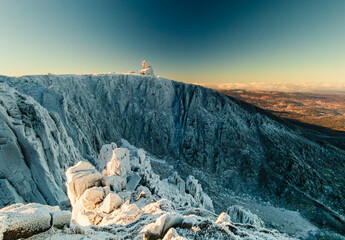 Frozen Mountain Path and Cliffs of Śnieżne Kotły in Winter	