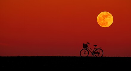 Obraz premium Bicycle Silhouette Under Full Moon in Red Sky Night Landscape