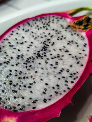 Fresh Cutted Pitahaya Slices Closeup Food Photoshoot. Detailed Exotic Fruit Texture. Still life 