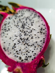 Fresh Cutted Pitahaya Slices Closeup Food Photoshoot. Detailed Exotic Fruit Texture. Still life 
