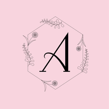 Lettre A florale &eacute;l&eacute;gante en monogramme avec illustration botanique en line art dans un cadre hexagonal sur fond rose doux