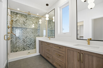 Bathroom with a shower stall and a sink