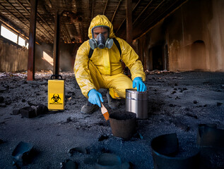 Man in a HazMat suit looking for evidence of chemical or biological contamination