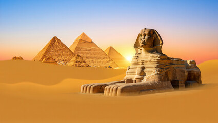 Iconic Great Sphinx of Giza and Pyramid at Sunset in Golden Desert Sand