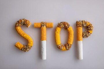 Creative artwork spelling stop with twisted cigarettes conveys a strong anti-smoking message in a unique way