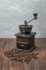grinder , coffee beans. Selection of fresh coffee for espresso.  wooden background, copyspace.