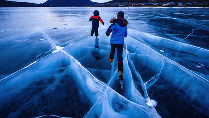 Two Kids Running on Deep Blue Cracked Frozen Lake Ice Adventure