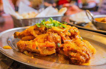 Close up shot of a delicious Indian style chicken wings