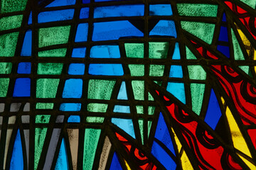 Abstract colorful geometric pattern of a modern stained glass wi