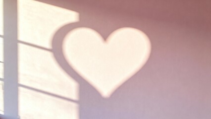 Fototapeta premium Valentine's Day Background. Minimalist Pink Room with Love Symbol made of Light.