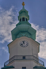 Close-up of Bratislava Castle Crown Tower clock and oxidized cop