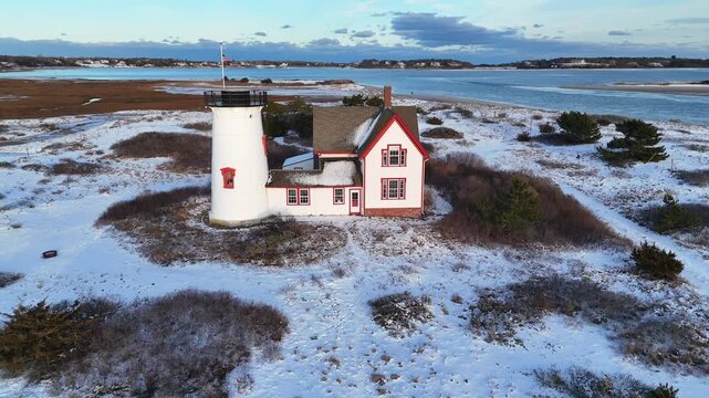 Drone Aerial of Chatham, Cape Cod Coastline and Lighthouse in Winter