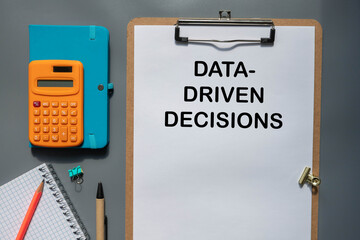 Data-Driven text handwritten by a person's hand with red underline