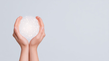 Hands holding crystal sphere glowing with light and sparkles, close up of palms cupping transparent orb giving soft glow and gentle warmth conveying wonder and hope