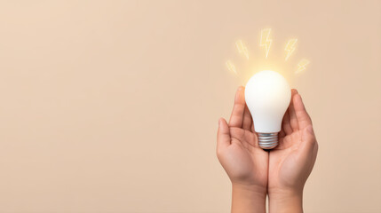 Hands holding glowing light bulb innovation idea concept with warm neutral background and gentle lighting evoking inspiration and creativity