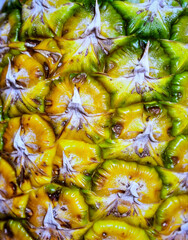 Close up pineapple flesh surface showing natural tropical fruit texture and organic pattern