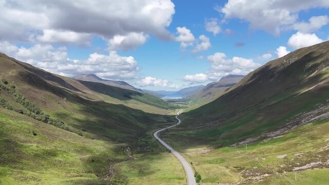 Drone ascending over Kinlochewe viewpoint &ndash; Loch Maree aerial reveal, Scottish Highlands nature landscape travel b-roll