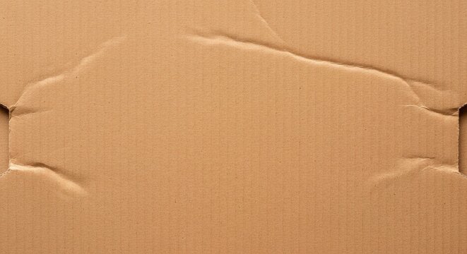 Closeup of a crumpled cardboard box surface texture