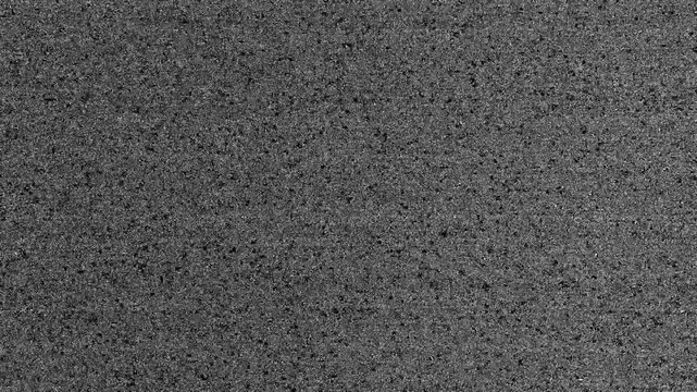 Abstract black and white grainy texture of electromagnetic interference overlay. Trippy distortion overlay effect. Background grain noise of electronic device, sensor read. Error effect, lost signal.