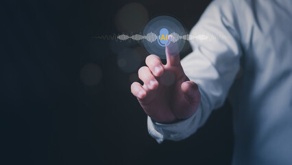 Close up of a businessman touching a virtual AI voice assistant interface with sound waves. Concept...