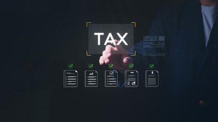 Businessman touching virtual TAX screen for online tax payment, financial document management, and income calculation, Professional concept for annual tax filing and corporate fiscal audit.