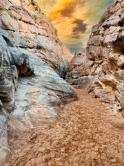 Valley of fire park landscape in Nevada state of America during nice winter day displaying cave rock formation during sunset