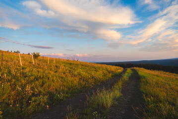 Evening Sky Over A Two Track