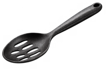 Black slotted spoon resting, kitchen utensil for cooking and serving food, ideal for draining liquids, transparent background