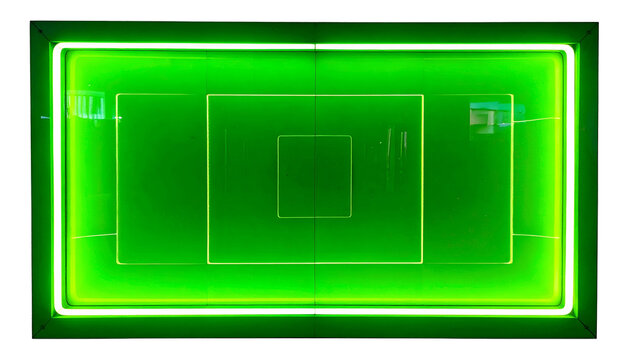 Aerial view of a neon-lit, rectangular structure within a larger, square frame, radiating a vibrant green glow against black - Powered by Adobe