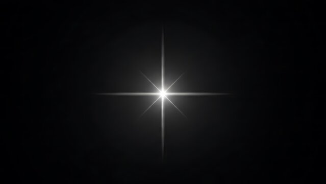 Bright white starburst on black background with radiant light effect