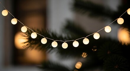 Close-up of string lights garland, illuminated decoration