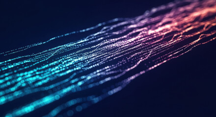 Abstract streaks of blue and red particles flowing on a dark background create a modern digital technology concept with dynamic energy and motion.